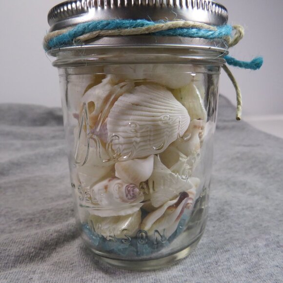 Jar of REAL sea shells and with blue sparkly vase filler at bottom - Picture 5 of 13